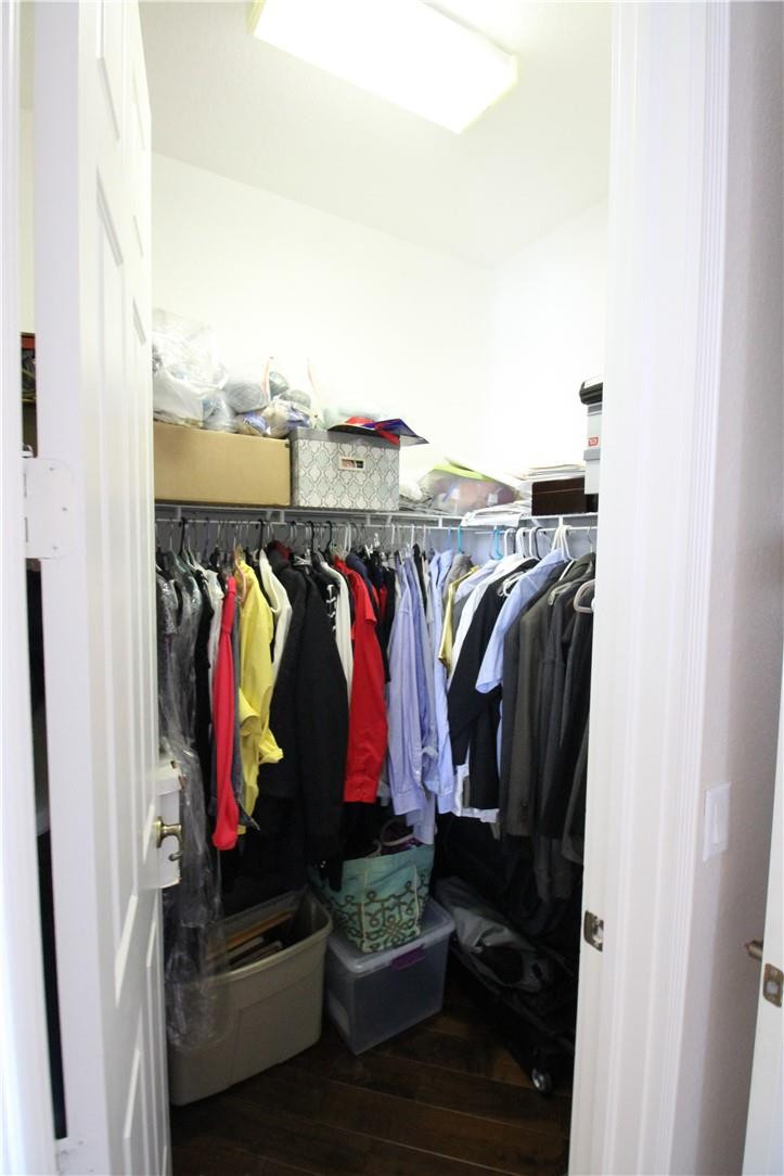 8316 Northwest 8th Terrace Boca Raton, FL 33487 - Photo 21 of 34 a view of walk in closet with clothes and shoes