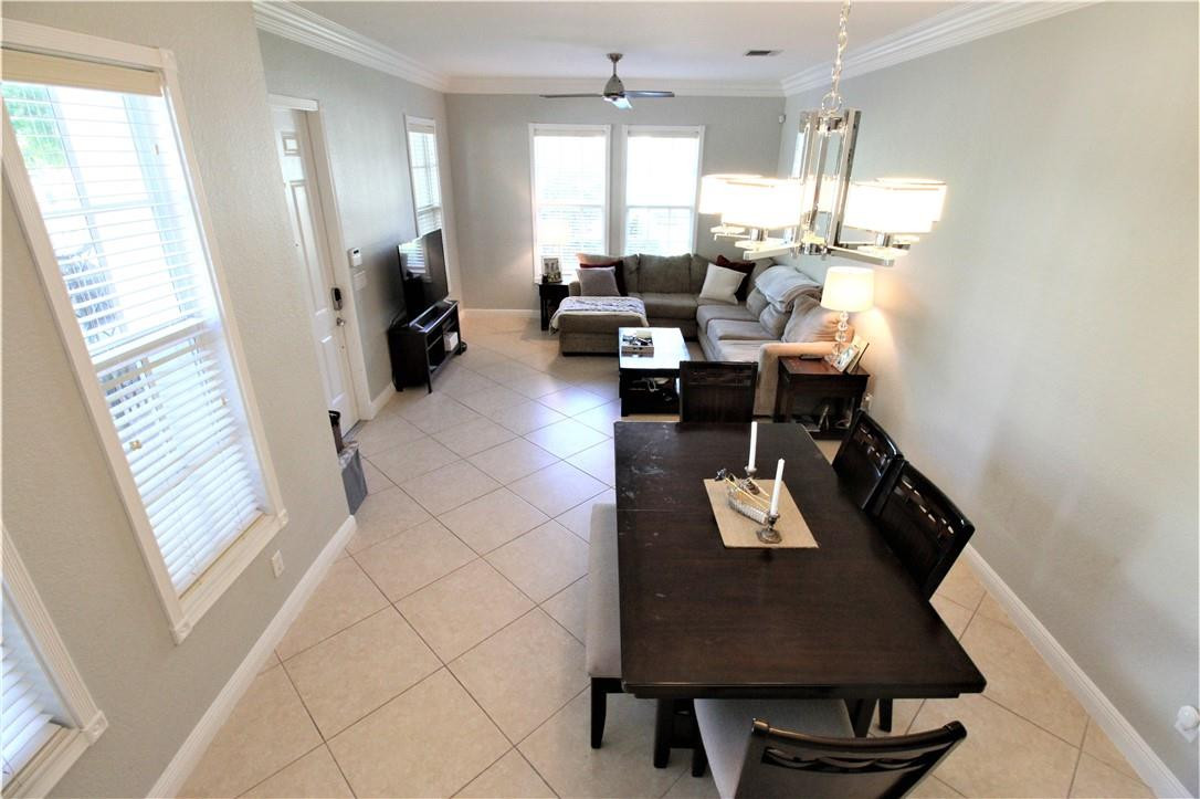 8316 Northwest 8th Terrace Boca Raton, FL 33487 - Photo 3 of 34 a living room with furniture and a window