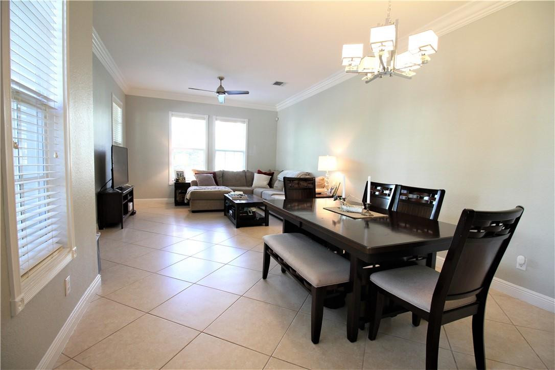 8316 Northwest 8th Terrace Boca Raton, FL 33487 - Photo 5 of 34 a view of a dining room with furniture