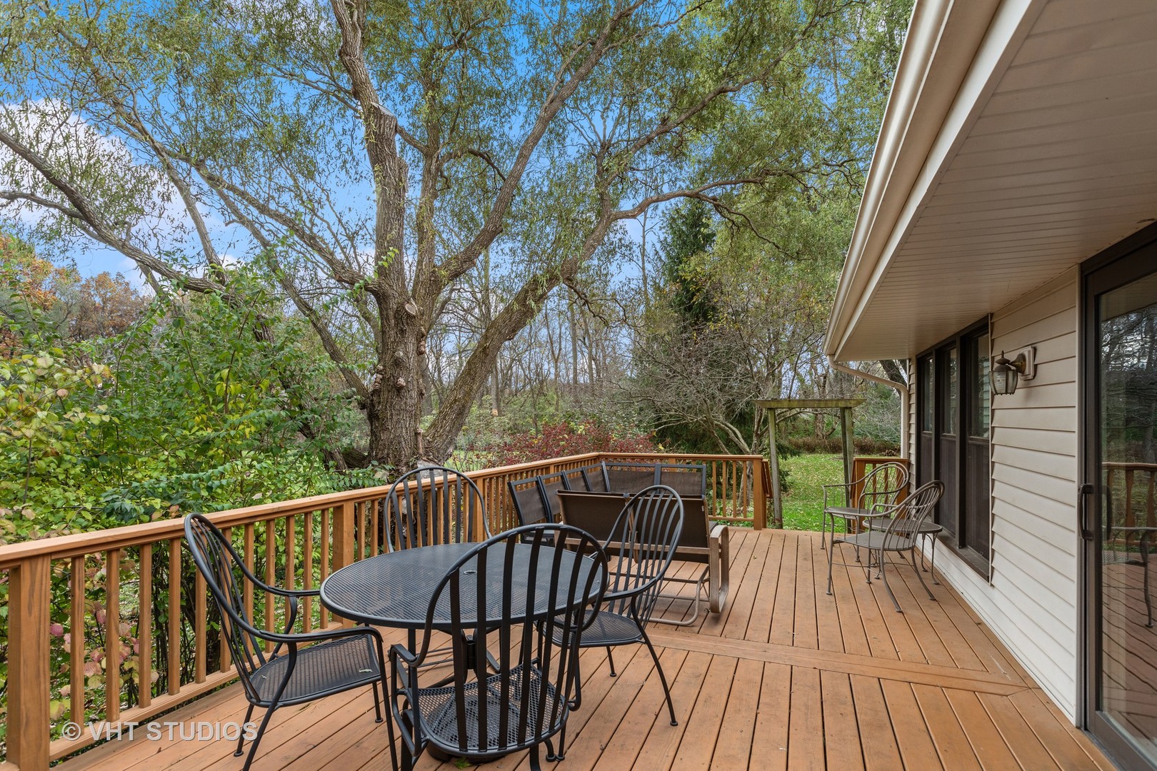 301 Oak Crest Road Cary, IL 60013 - Photo 23 of 27 a view of balcony with furniture and wooden deck