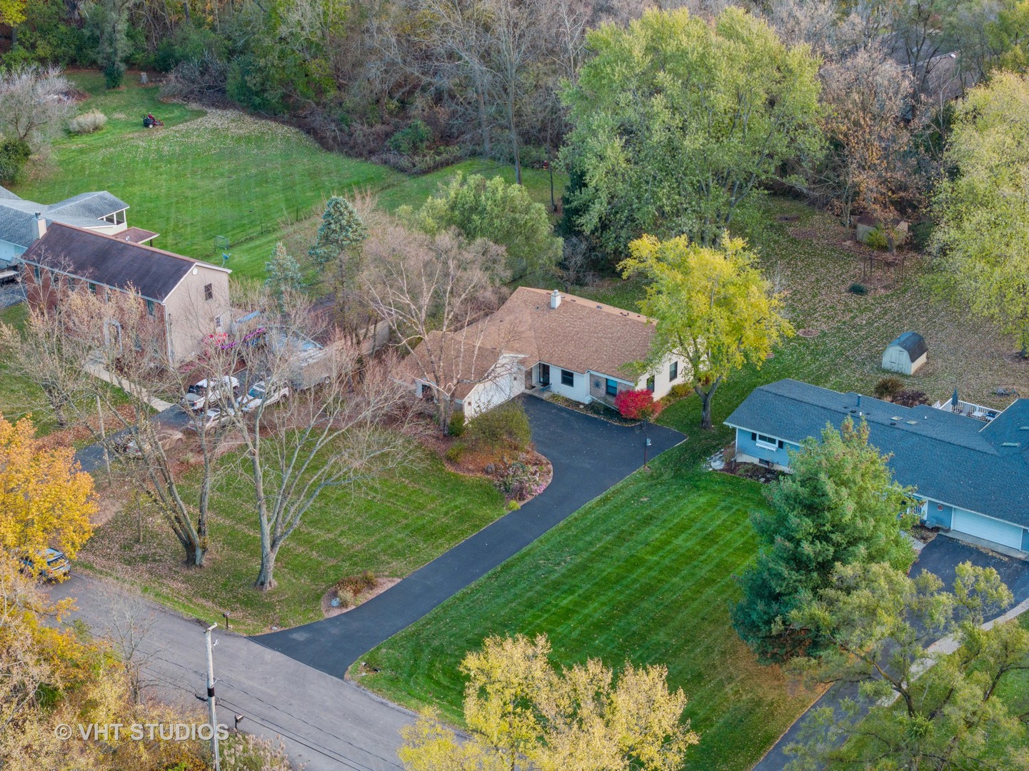 301 Oak Crest Road Cary, IL 60013 - Photo 26 of 27 an aerial view of a house with a yard
