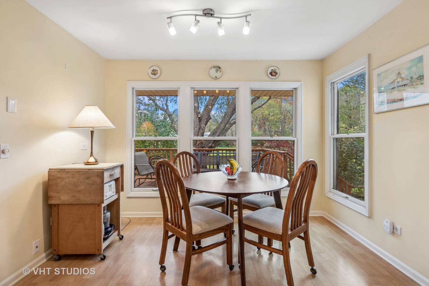 301 Oak Crest Road Cary, IL 60013 - Photo 9 of 27 a view of a dining room with furniture window and outside view