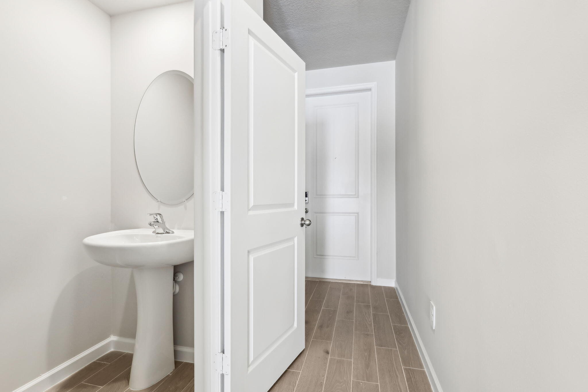 478 Salisbury Circle Fort Pierce, FL 34982 - Photo 15 of 35 a bathroom with a sink a mirror and vanity
