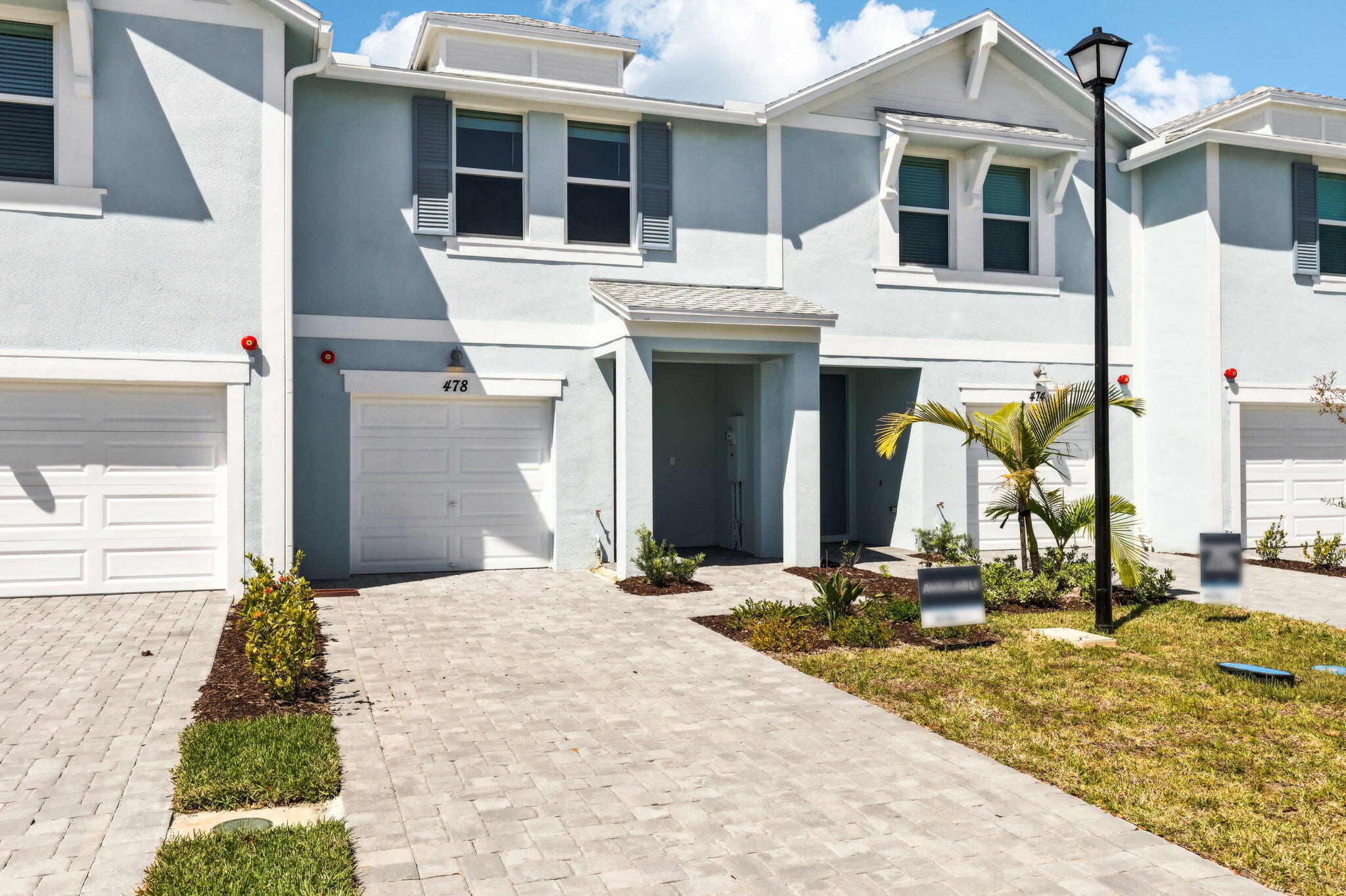 478 Salisbury Circle Fort Pierce, FL 34982 - Photo 2 of 35 a front view of a house with large windows