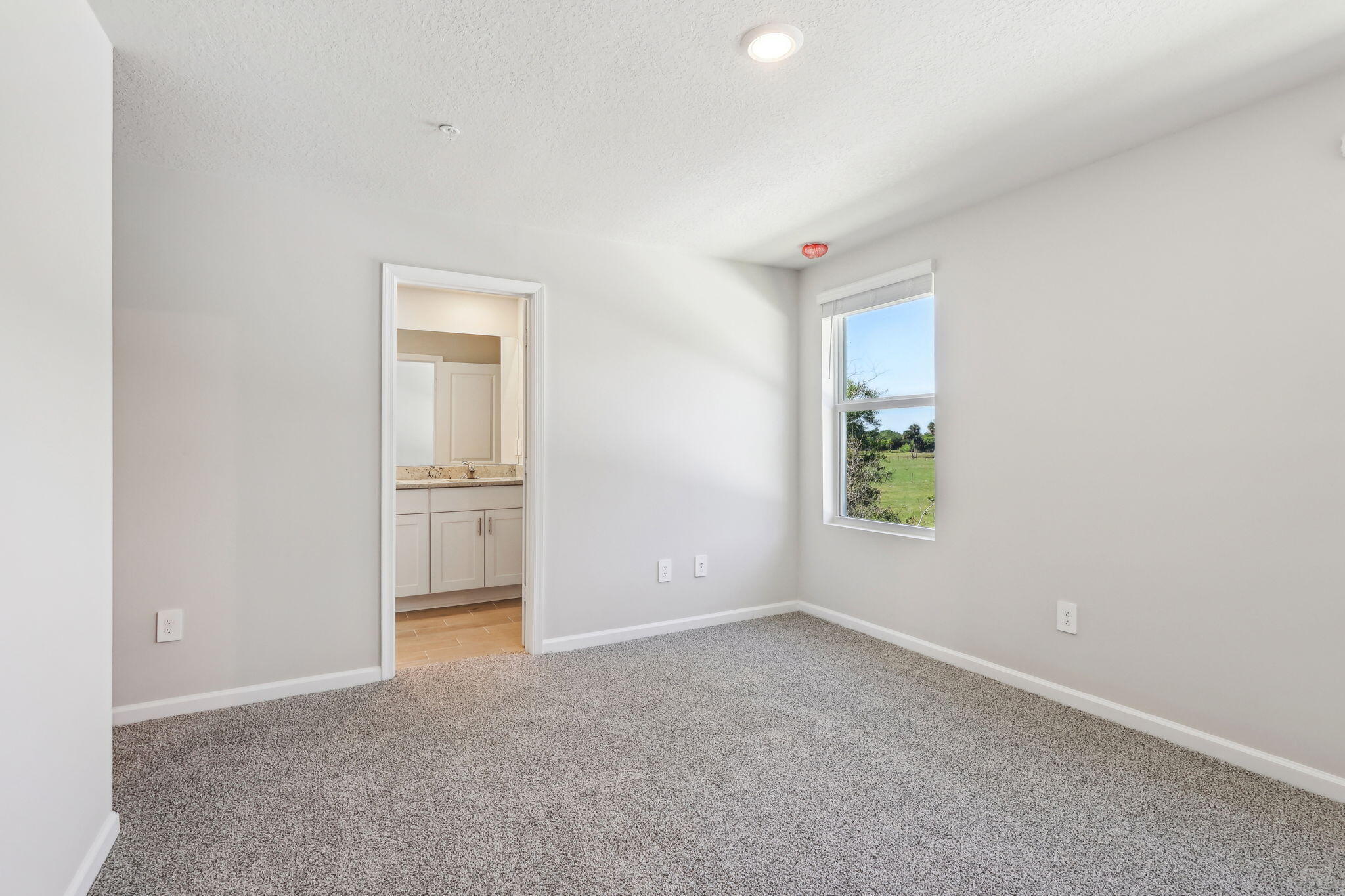 478 Salisbury Circle Fort Pierce, FL 34982 - Photo 29 of 35 an empty room with windows and wardrobe