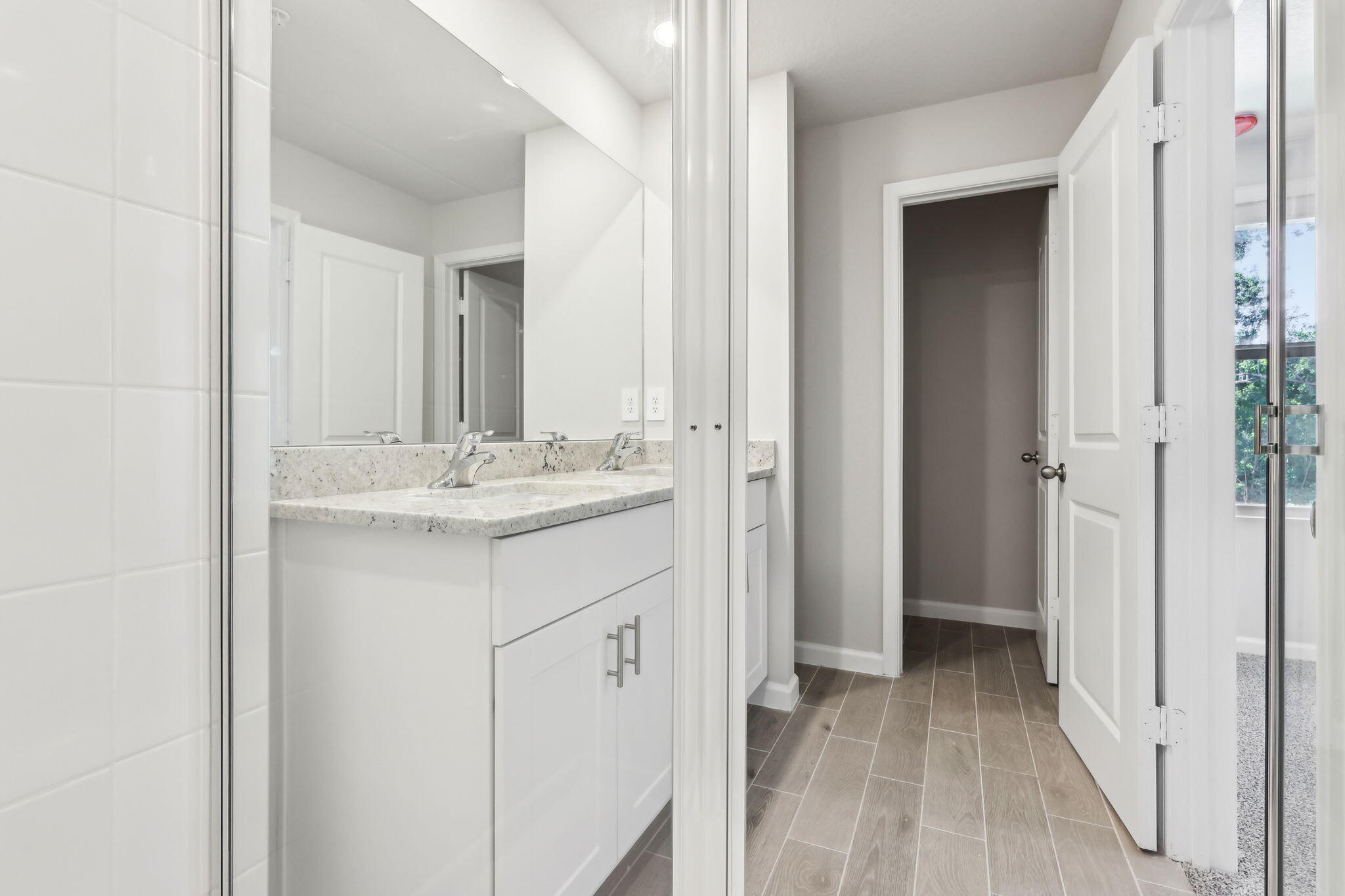 478 Salisbury Circle Fort Pierce, FL 34982 - Photo 31 of 35 a bathroom with a sink and a mirror