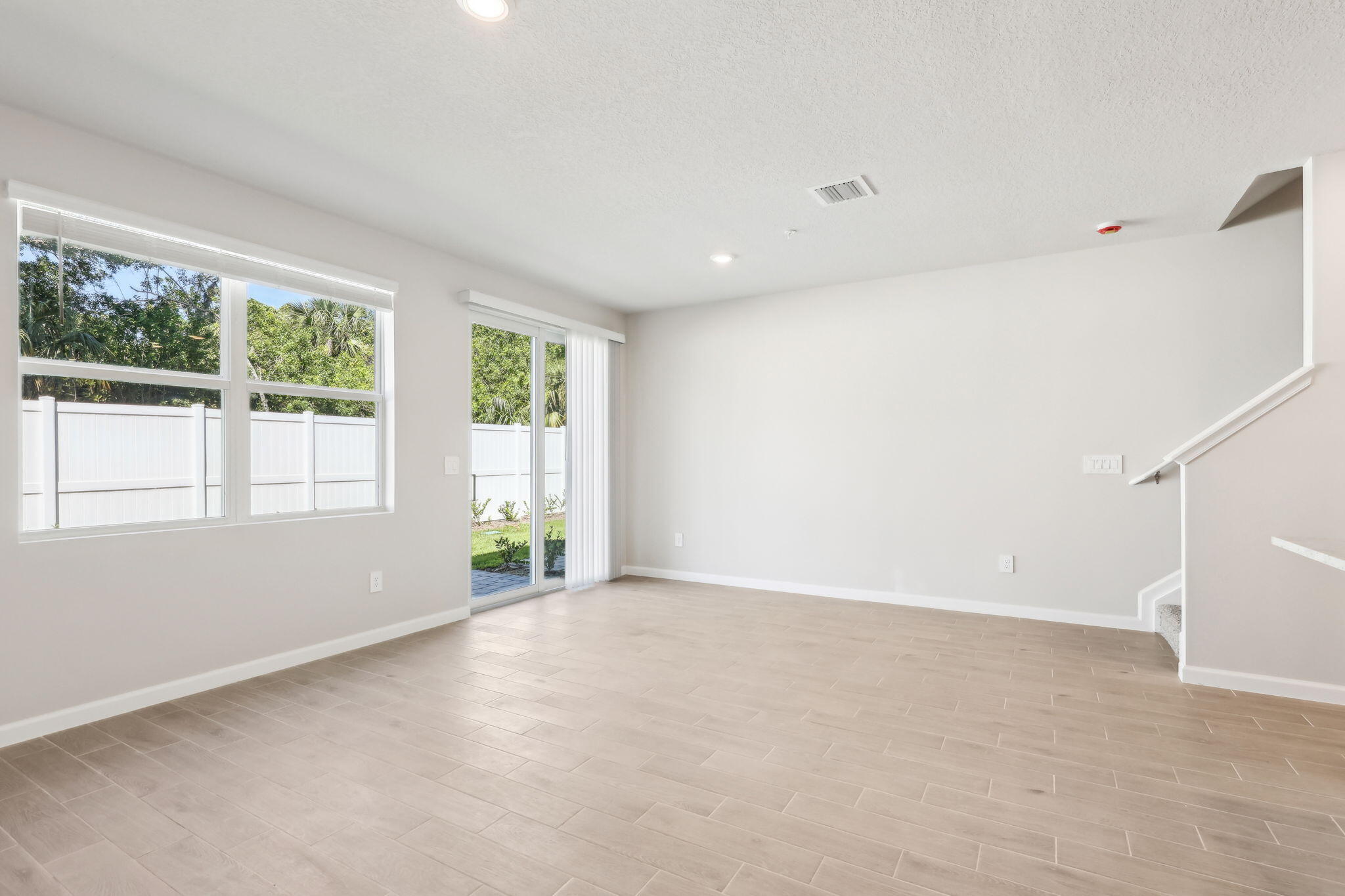 478 Salisbury Circle Fort Pierce, FL 34982 - Photo 9 of 35 a view of an empty room with a window