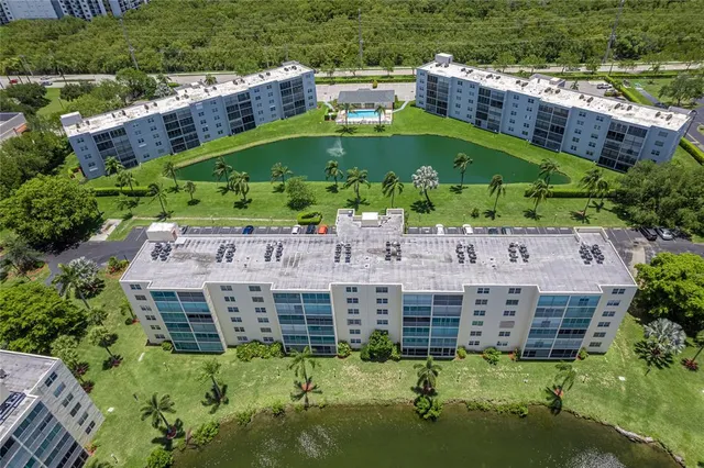 an aerial view of residential house with outdoor space
