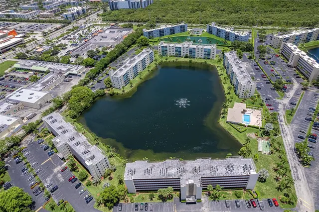 a aerial view of a building with a garden and plants