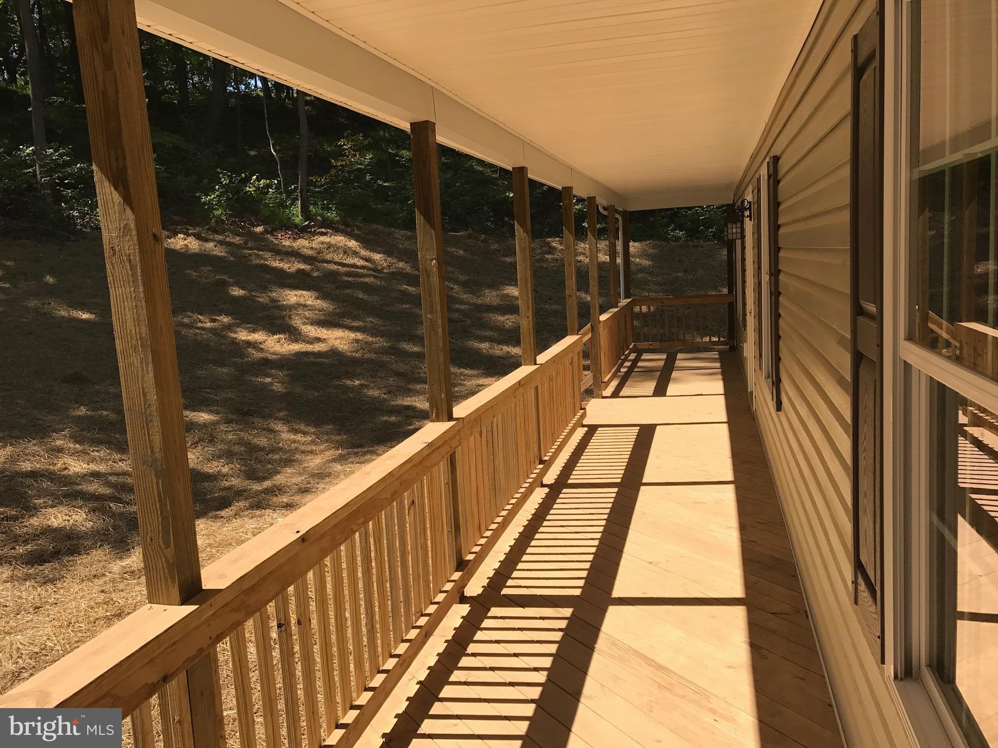 768 Farms River Road Front Royal, VA 22630 - Photo 23 of 32 Full Length Covered Front Porch - Photo Similar
