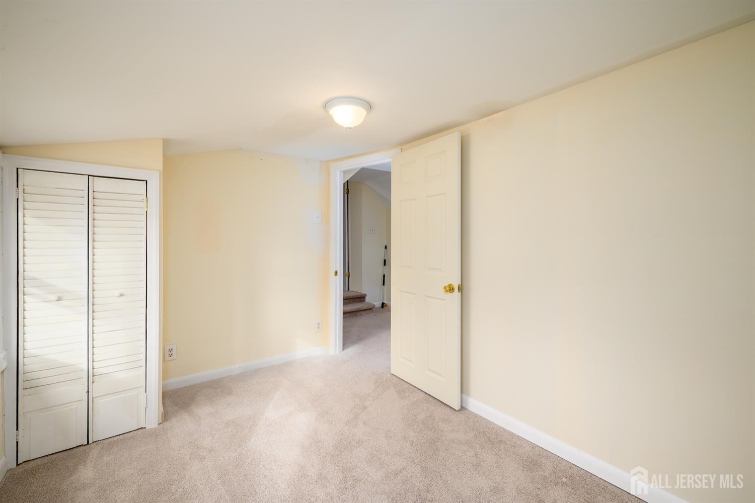 65 Orange Street Edison, NJ 08817 - Photo 16 of 51 an empty room with a bathroom