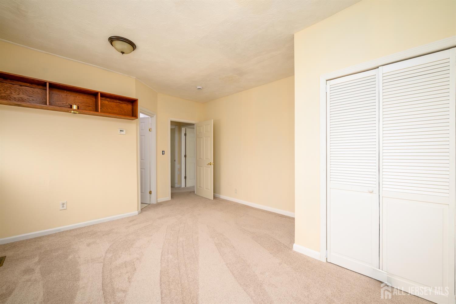 65 Orange Street Edison, NJ 08817 - Photo 23 of 51 a view of a room with a hallway