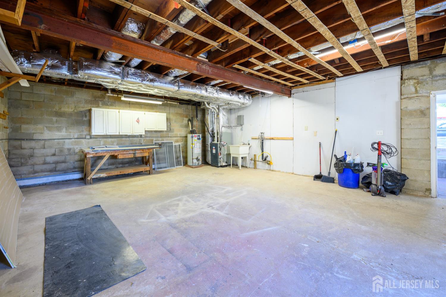 65 Orange Street Edison, NJ 08817 - Photo 30 of 51 a view of a storage room with gym equipment