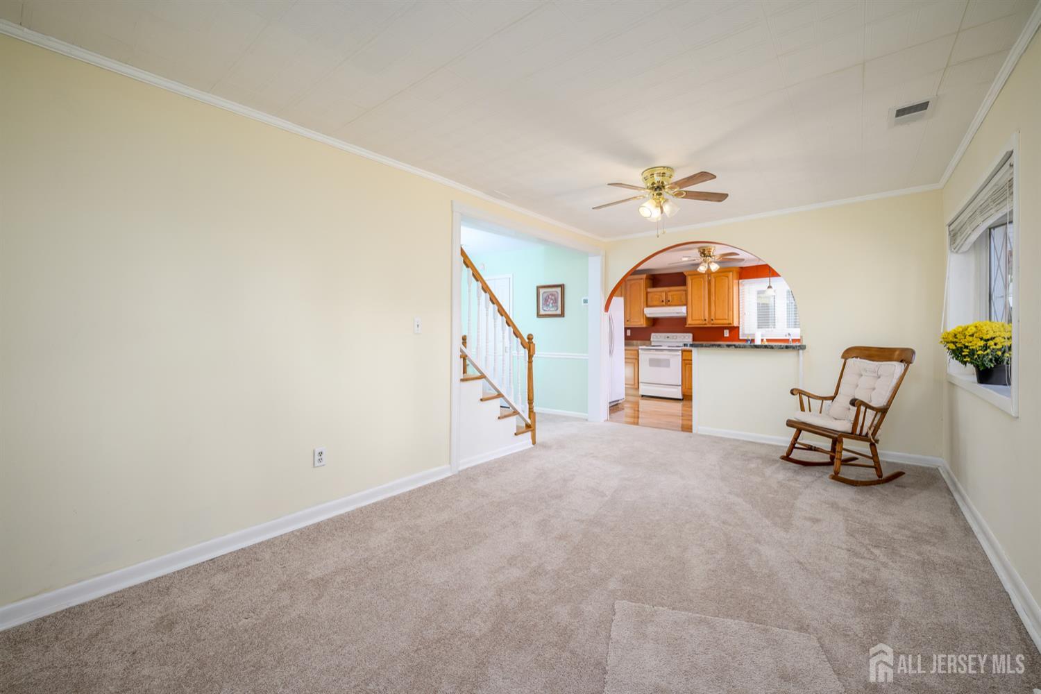 65 Orange Street Edison, NJ 08817 - Photo 35 of 51 an empty room with furniture and a chandelier