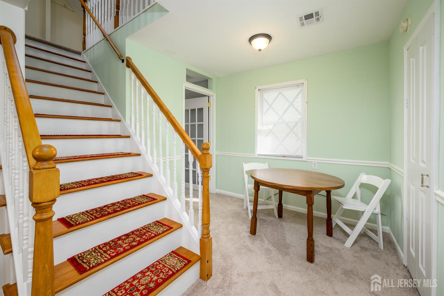 65 Orange Street Edison, NJ 08817 - Photo 38 of 51 a view of entryway with wooden floor and a front door
