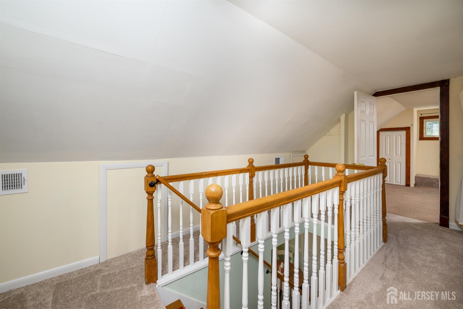 65 Orange Street Edison, NJ 08817 - Photo 43 of 51 a view of staircase with lots of wooden floor