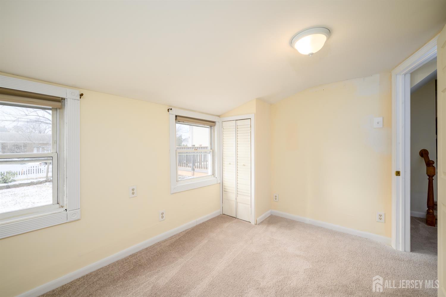 65 Orange Street Edison, NJ 08817 - Photo 9 of 51 a view of an empty room with a window