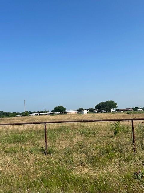 2400-block Strader Road Justin, TX 76247 - Photo 4 of 7 a view of an ocean and beach