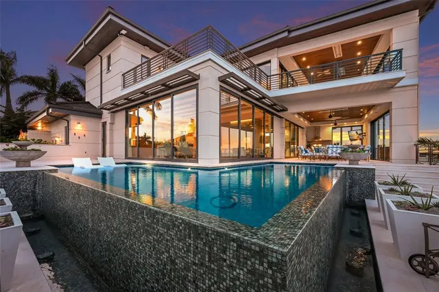 a bathroom with a double vanity sink and a window