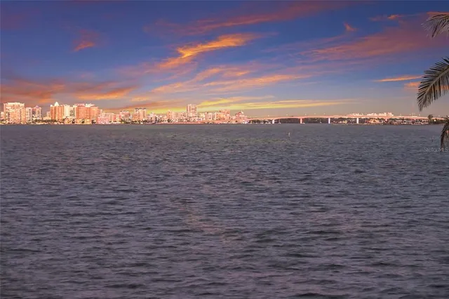 a bedroom with a bed and a cabinets