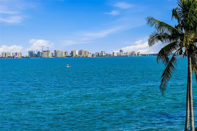 image of a utility room with a sink and a mirror