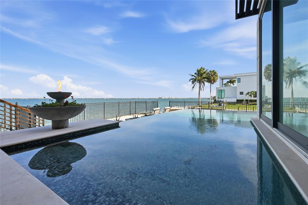 600 Wedge Lane Longboat Key, FL 34228 - Photo 30 of 82 a balcony with view of ocean