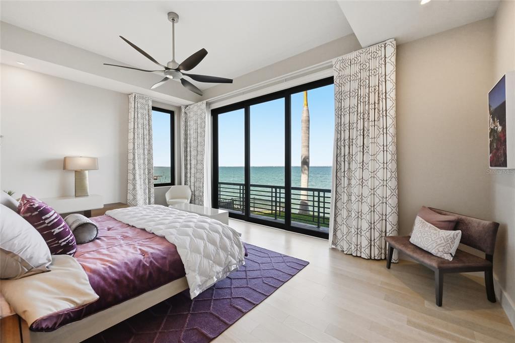 600 Wedge Lane Longboat Key, FL 34228 - Photo 38 of 82 a bedroom with a large bed and a window
