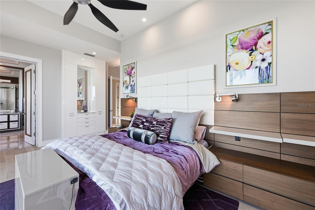 600 Wedge Lane Longboat Key, FL 34228 - Photo 39 of 82 a bedroom with a bed and a cabinets