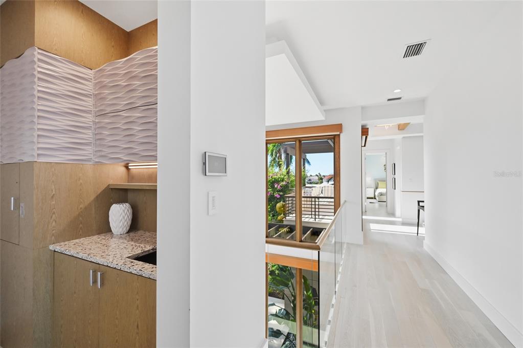 600 Wedge Lane Longboat Key, FL 34228 - Photo 56 of 82 a bathroom with a granite countertop sink and a mirror