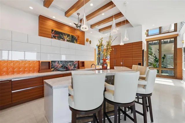 a view of a patio with couches table and chairs
