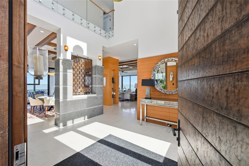 600 Wedge Lane Longboat Key, FL 34228 - Photo 74 of 82 a bedroom with furniture and a window