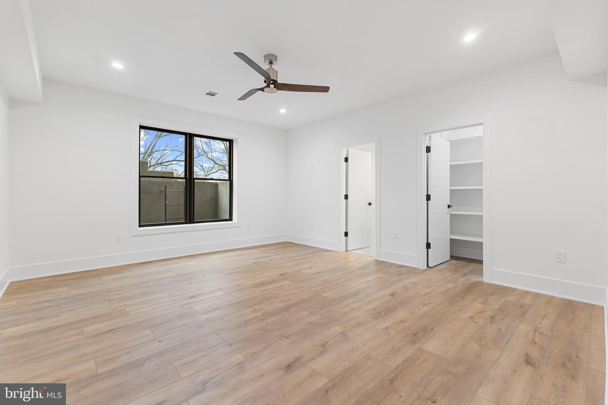 1912 Anderson Road Falls Church, VA 22043 - Photo 21 of 40 a view of an empty room with a window and wooden floor