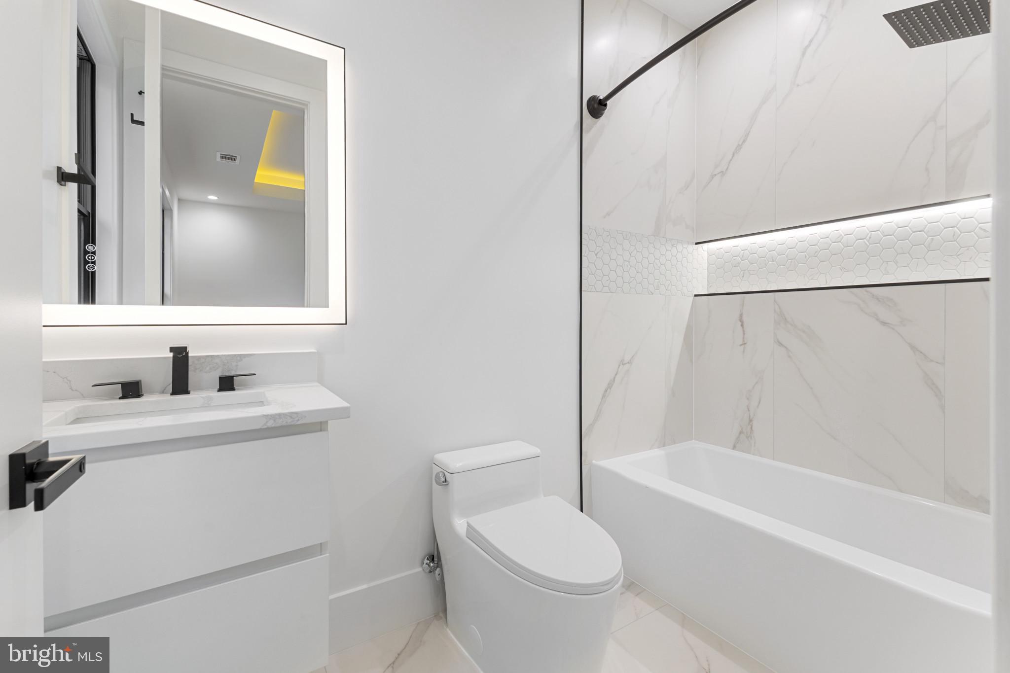 1912 Anderson Road Falls Church, VA 22043 - Photo 26 of 40 a bathroom with a sink toilet and shower