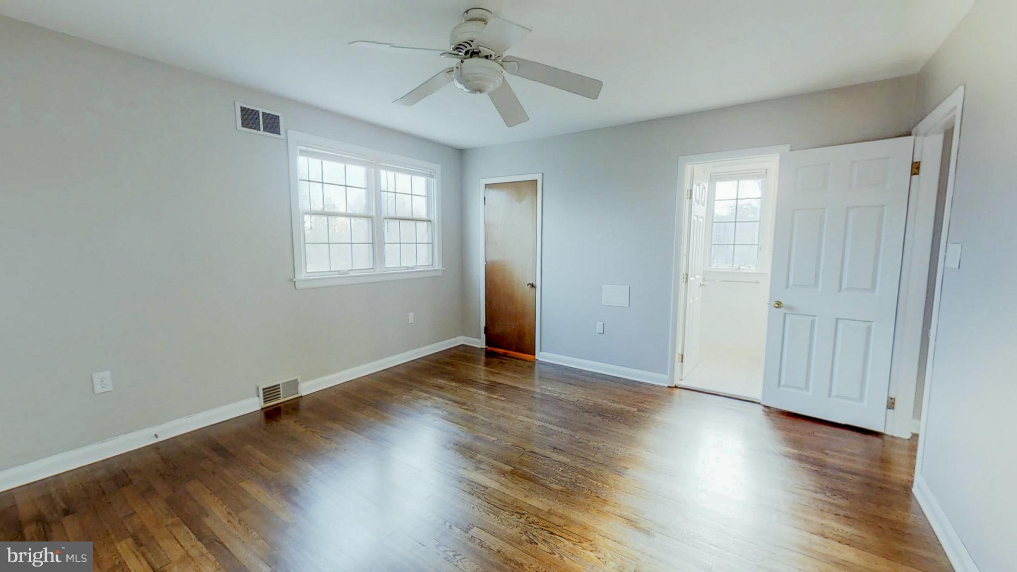 2402 Brickton Road Wilmington, DE 19803 - Photo 18 of 25 Master suite with full bath, fan, & walk-in closet