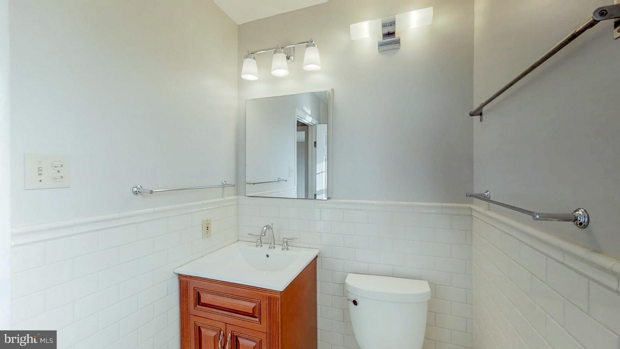 2402 Brickton Road Wilmington, DE 19803 - Photo 24 of 25 Fully renovated hall bath with custom tile