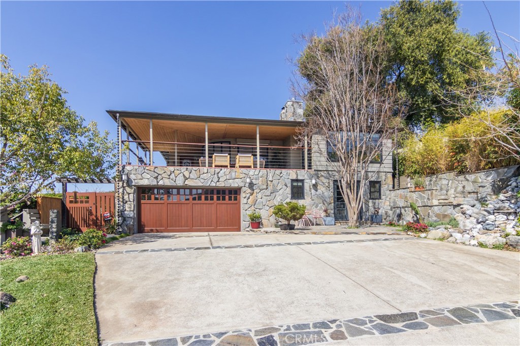 751 Ridgeside Drive Monrovia, CA 91016 - Photo 1 of 65 a front view of a house with a yard