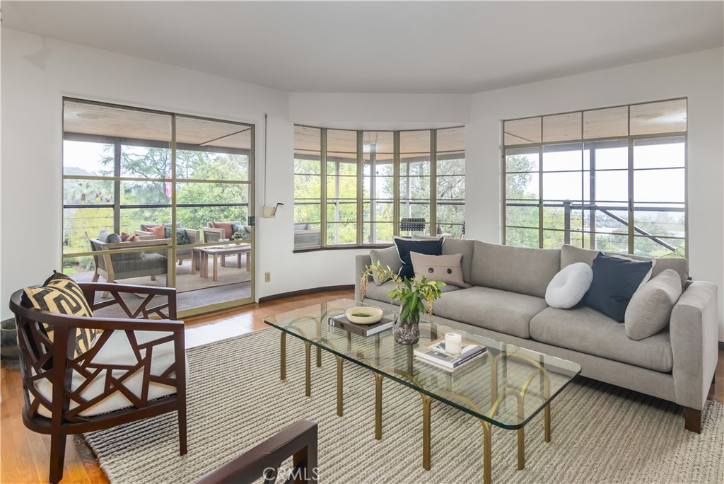 751 Ridgeside Drive Monrovia, CA 91016 - Photo 14 of 65 a living room with furniture and a large window