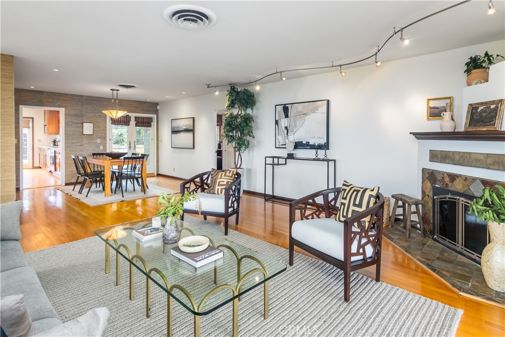 751 Ridgeside Drive Monrovia, CA 91016 - Photo 15 of 65 a living room with furniture and a fireplace