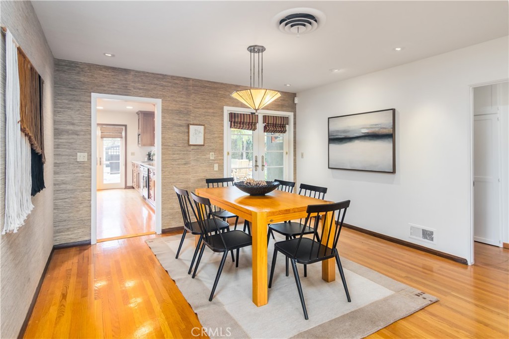 751 Ridgeside Drive Monrovia, CA 91016 - Photo 17 of 65 a view of a dining room with furniture and wooden floor