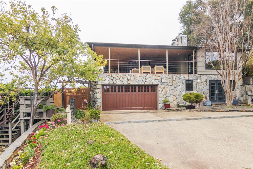 751 Ridgeside Drive Monrovia, CA 91016 - Photo 2 of 65 front view of house with a bench