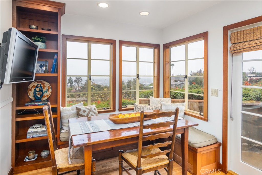 751 Ridgeside Drive Monrovia, CA 91016 - Photo 26 of 65 a living room with fireplace furniture and a floor to ceiling window