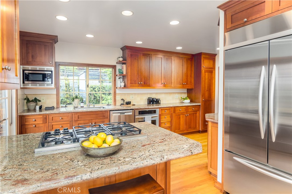 751 Ridgeside Drive Monrovia, CA 91016 - Photo 27 of 65 a kitchen with counter top space cabinets and appliances