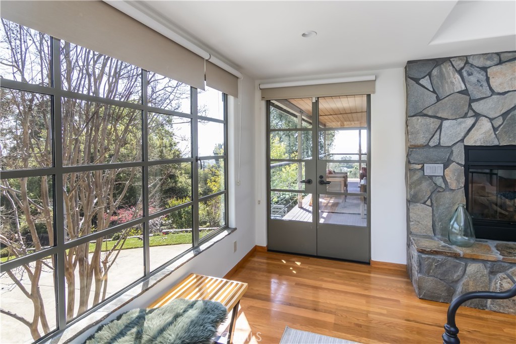 751 Ridgeside Drive Monrovia, CA 91016 - Photo 35 of 65 a view of an empty room with wooden floor and a window