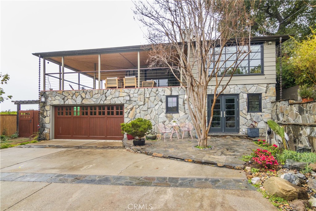 751 Ridgeside Drive Monrovia, CA 91016 - Photo 4 of 65 a backyard of a house with flower plants
