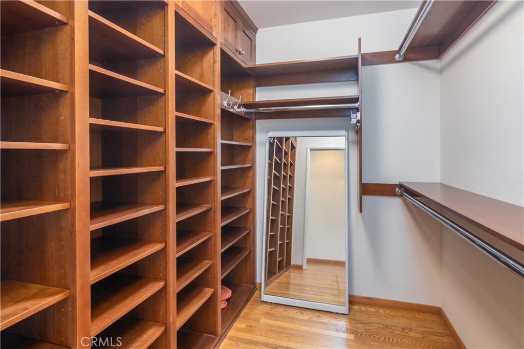 751 Ridgeside Drive Monrovia, CA 91016 - Photo 41 of 65 a view of walk in closet with empty racks