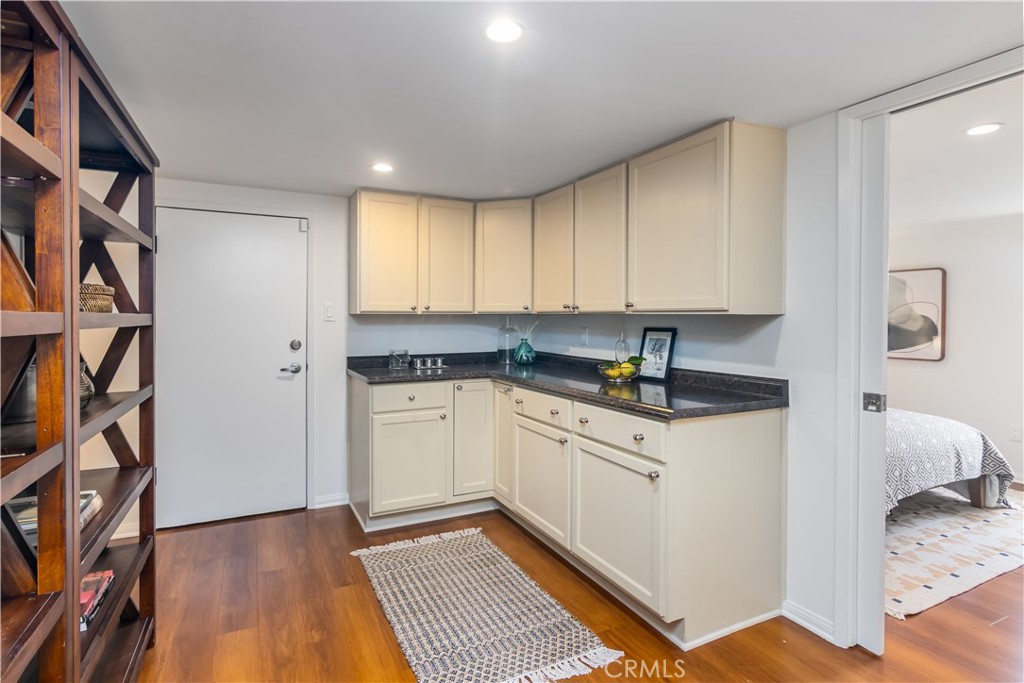 751 Ridgeside Drive Monrovia, CA 91016 - Photo 46 of 65 a kitchen with stainless steel appliances granite countertop a sink and cabinets