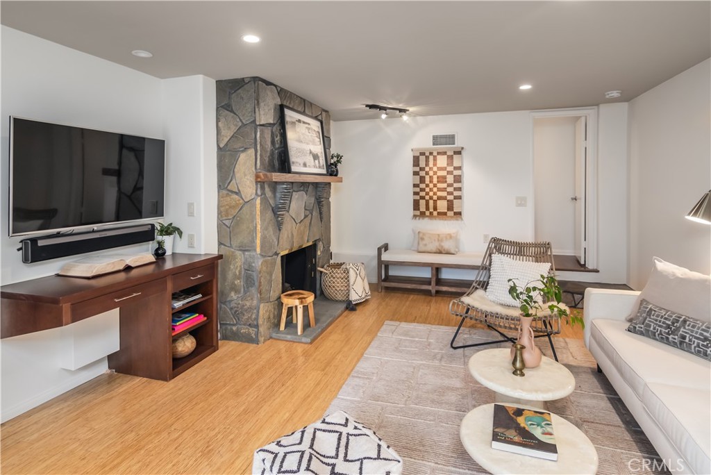 751 Ridgeside Drive Monrovia, CA 91016 - Photo 49 of 65 a living room with furniture and a flat screen tv