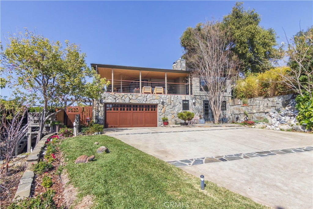 751 Ridgeside Drive Monrovia, CA 91016 - Photo 6 of 65 front view of a house with a yard