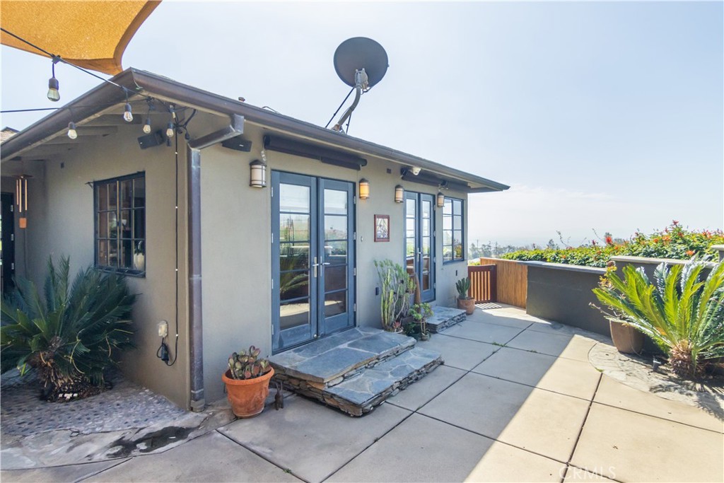 751 Ridgeside Drive Monrovia, CA 91016 - Photo 61 of 65 a view of a balcony with chairs potted plants