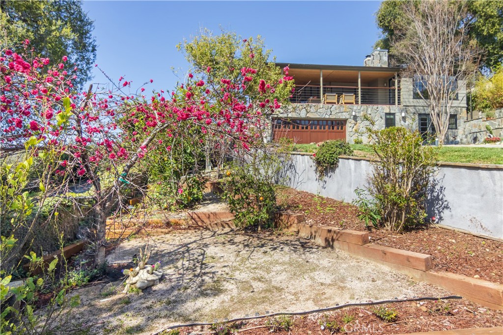 751 Ridgeside Drive Monrovia, CA 91016 - Photo 7 of 65 a front view of a house with a yard
